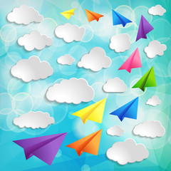 Set of flying colorful paper airplanes with clouds on the blue b