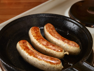 Cooking sausage in a pan