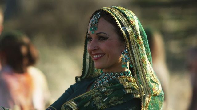 woman doing an Indian dance for Holi