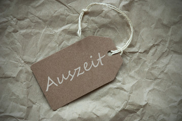 Beige Label With Auszeit Means Downtime Paper