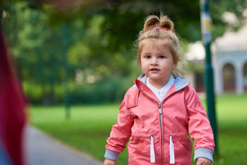 little girl have fun in park