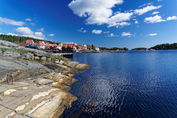 Colorful houses on the shore of Norwegian fjord