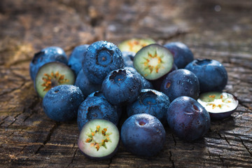 Fresh blueberries on wooden background
