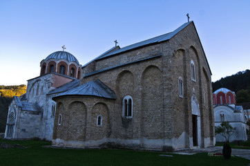 Fototapeta premium Two churches inside Studenica monastery at sunset