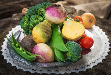 Homemade organic vegetables on wooden table 