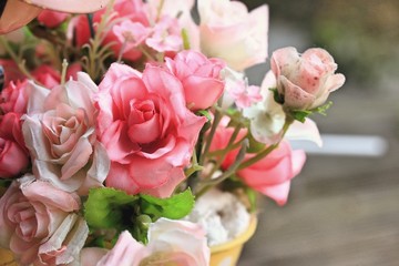 Beautiful vintage roses of artificial flowers