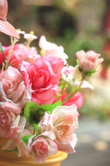 Beautiful vintage roses of artificial flowers