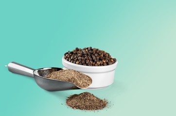 Pepper. Milled black pepper isolated on white background