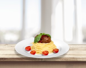 Background. Pasta with meatballs and parsley with tomato sauce