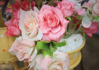 Beautiful vintage roses of artificial flowers