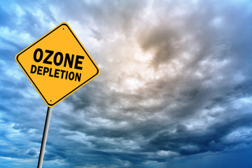 Sign with words 'Ozone depletion' and thunderclouds