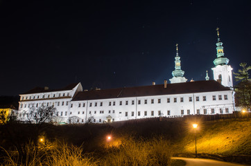 Fototapeta premium view of the illuminated strahov monastery in Prague