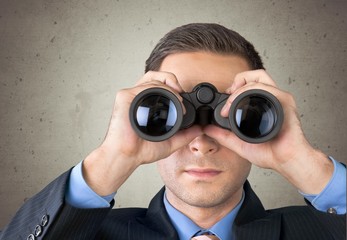 Binoculars. Searching the World Through Binoculars