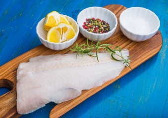 Raw fish fillets for frying on pan. kitchen composition.