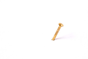 brass nails isolated on white Individuality concept