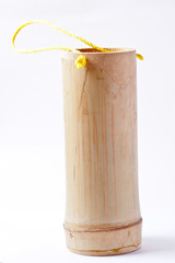 bamboo tube for drinking water on white background