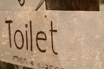 Vintage toilet sign
