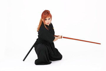 Woman training Haidong Gumdo, a martial art, Kendo form