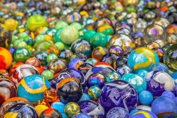 Fototapeta na wymiar Background of colorful marbles