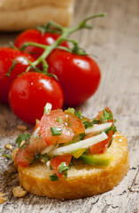 Italian bruschetta with tomato, onion and bell petsem, sample fo