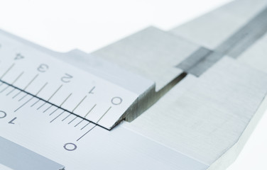 Vernier Caliper Close up Scale of Measurement on a white backgro