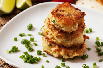 Homemade chicken cutlets sprinkled with green onion, selective f