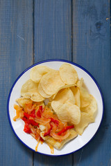 fried fish with vegetables on plate