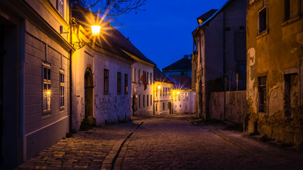 walking through old european town at night