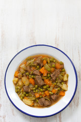 meat with vegetables in plate