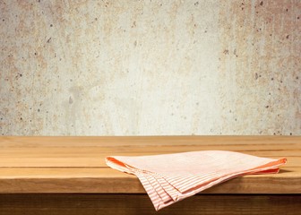 Wooden. Empty wooden table with tablecloth over polka dots