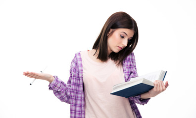 Young female student reading book