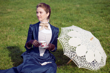 Romantic young beautiful lady outdoors