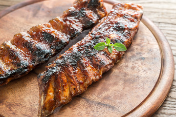 Grilled pork ribs on the wooden board