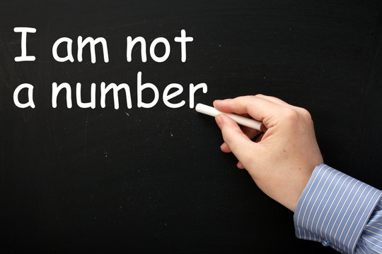 Writing I am Not a Number on a blackboard