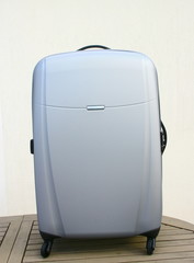 valise grise,moderne,isolé,fond blanc