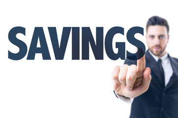 Business man pointing the text: Savings