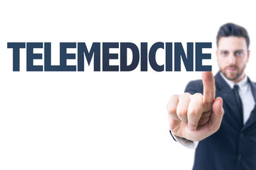 Business man pointing the text: Telemedicine