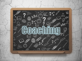 Education concept: Coaching on School Board background
