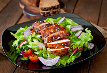 Fresh vegetable salad with grilled chicken breast