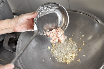 Adding the meat