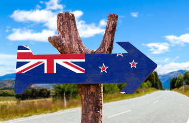 New Zealand Flag wooden sign with road background