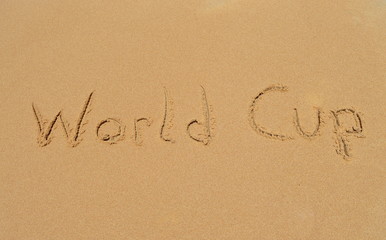 Fototapeta na wymiar Text 'world cup' in the sand