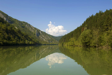 Naklejka na ściany i meble Drina river at Bosnia and Herzegovina surrounded with mountains