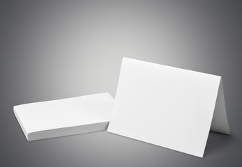 Card. Blank business cards on grey background