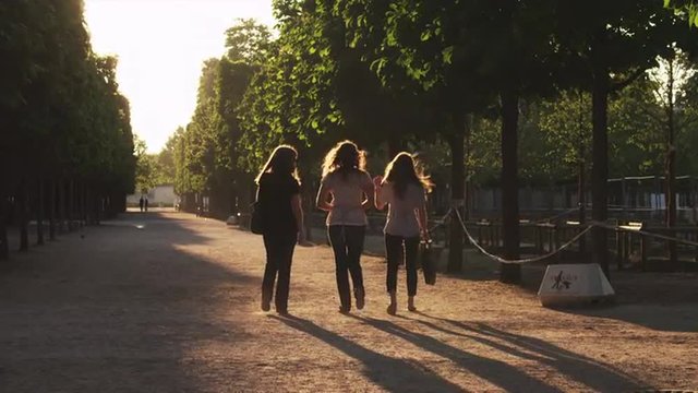 WS Three women walking in park / Jardin des Tuileries, Paris, France