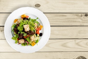 Salad. Fresh vegetable salad isolated on white background