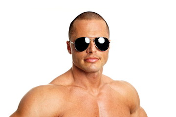 Portrait of handsome muscular man in sunglasses