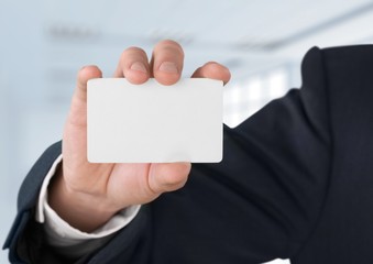 Business. Blank business card in a hand