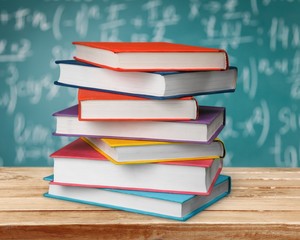 Academic. A pile of class books