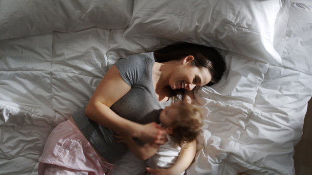 mother and baby lying down